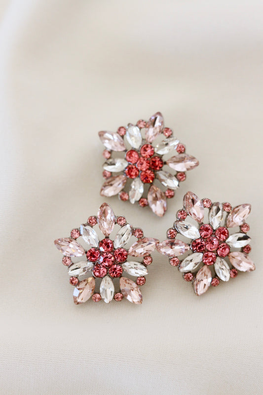 Rosa blingknapp